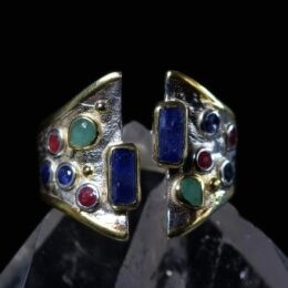 Wisdom in Love Blue Sapphire, Emerald, and Ruby Saddle Ring